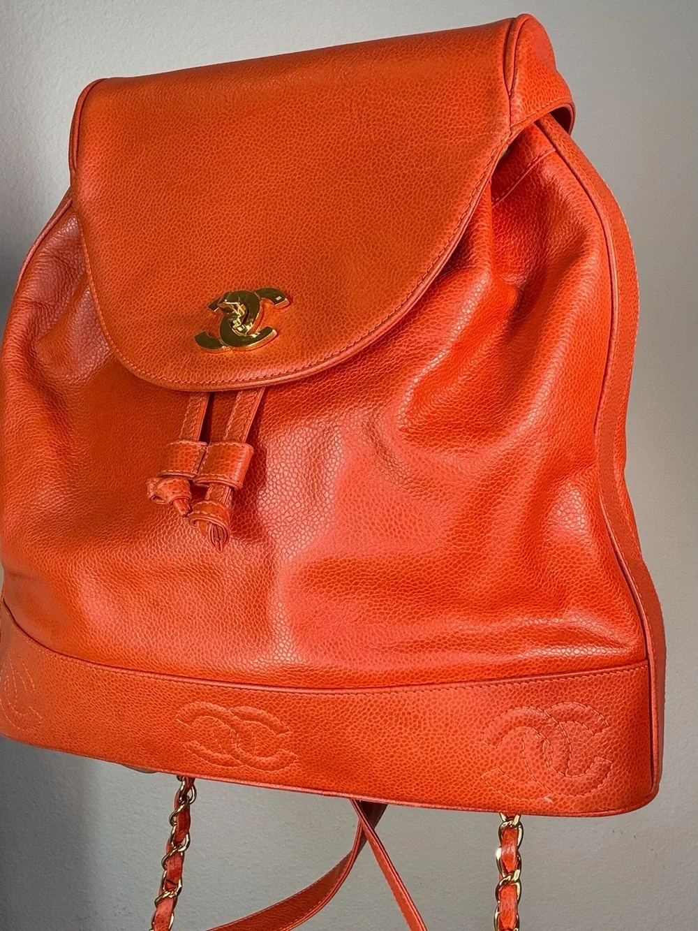 CHANEL Orange Caviar Leather Backpack with CC Trim and Gold Hardware
